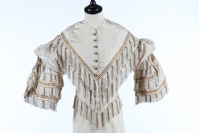 Lot 170 - A printed muslin day dress, late 1840s, with...