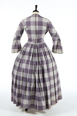 Lot 170 - A printed muslin day dress, late 1840s, with...