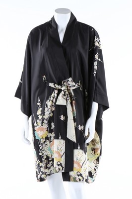 Lot 176 - A printed floral crepe garden party gown, mid...