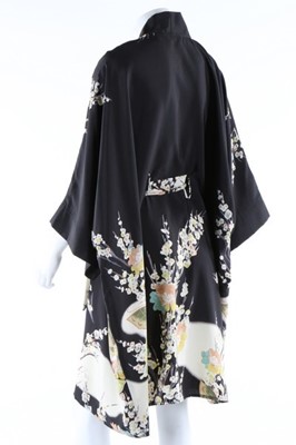 Lot 176 - A printed floral crepe garden party gown, mid...