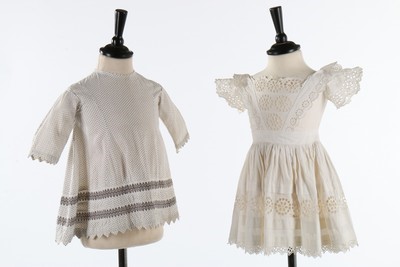 Lot 181 - A group of mainly white cotton children and...