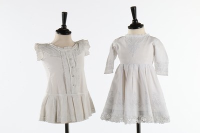 Lot 181 - A group of mainly white cotton children and...