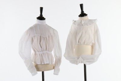 Lot 181 - A group of mainly white cotton children and...