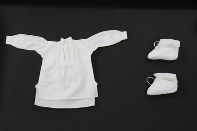 Lot 181 - A group of mainly white cotton children and...