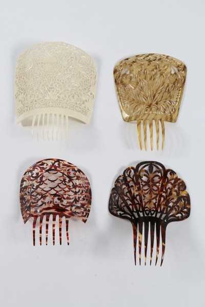 Lot 184 - A good group of headwear and haircombs,...