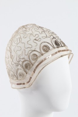 Lot 185 - A group of exotic feather hat ornaments, silk...