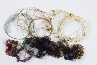 Lot 185 - A group of exotic feather hat ornaments, silk...