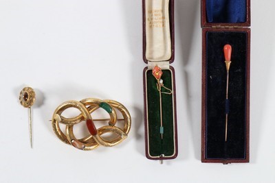 Lot 187 - A group of accessories, including hat pins,...
