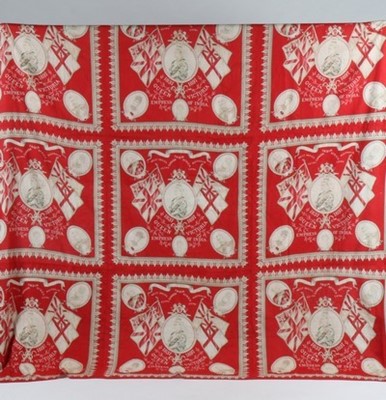 Lot 194 - A scarlet and red hexagonal patchwork quilt,...
