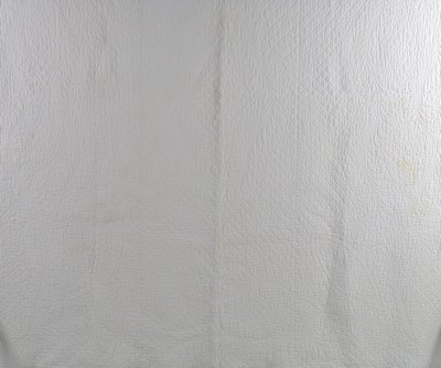 Lot 194 - A scarlet and red hexagonal patchwork quilt,...