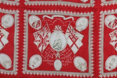 Lot 194 - A scarlet and red hexagonal patchwork quilt,...