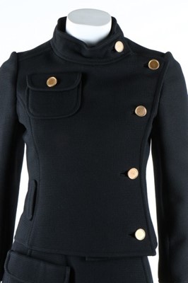 Lot 202 - A Courreges black wool suit, circa 1969, Paris...