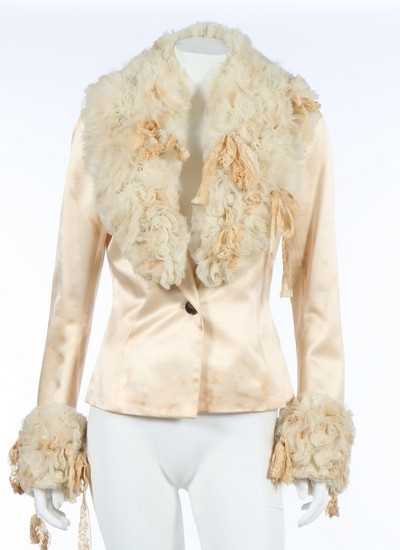 Lot 204 - A John Galliano ivory satin and tousled tulle...