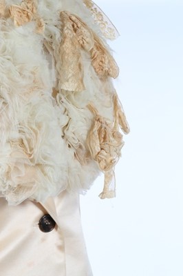 Lot 204 - A John Galliano ivory satin and tousled tulle...