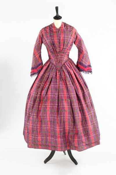 Lot 208 - A tartan taffeta gown with day and evening...