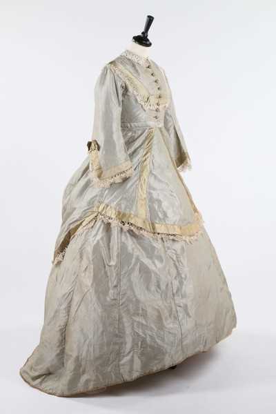 Lot 209 - A striped grey and ivory taffeta gown, late...