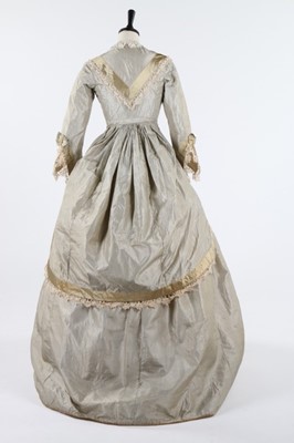 Lot 209 - A striped grey and ivory taffeta gown, late...
