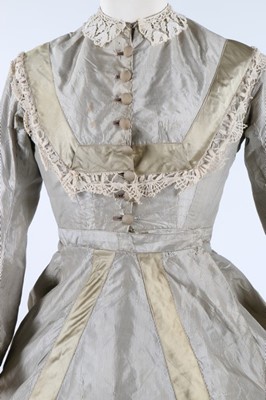 Lot 209 - A striped grey and ivory taffeta gown, late...