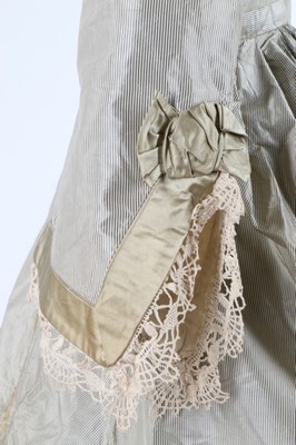 Lot 209 - A striped grey and ivory taffeta gown, late...
