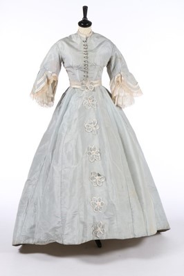 Lot 210 - A pale blue silk gown with day and evening...