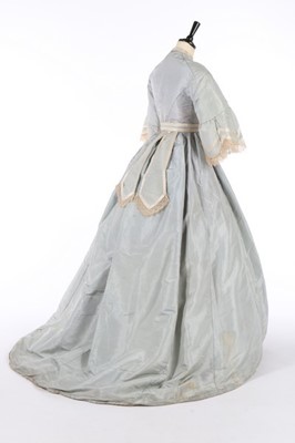 Lot 210 - A pale blue silk gown with day and evening...