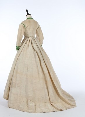 Lot 210 - A pale blue silk gown with day and evening...