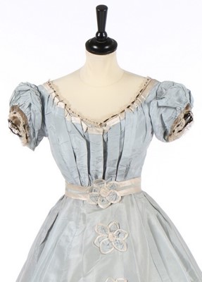 Lot 210 - A pale blue silk gown with day and evening...