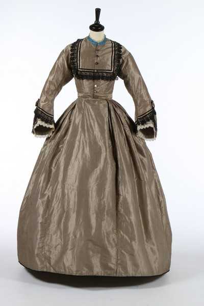 Lot 211 - A black and tan striped taffeta dress, late...