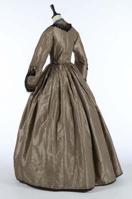 Lot 211 - A black and tan striped taffeta dress, late...