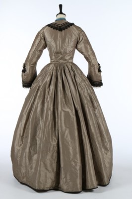 Lot 211 - A black and tan striped taffeta dress, late...