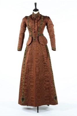 Lot 213 - A brown moire dress, circa 1890, comprising...