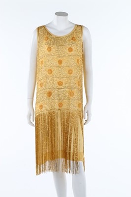 Lot 216 - A beaded yellow muslin flapper dress with...