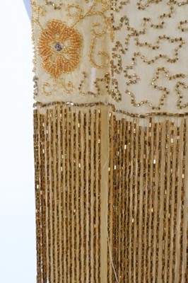 Lot 216 - A beaded yellow muslin flapper dress with...