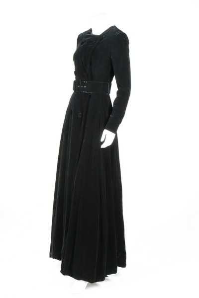 Lot 235 - A Dior London black velvet evening coat, late...