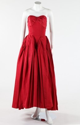 Lot 235 - A Dior London black velvet evening coat, late...