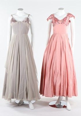 Lot 235 - A Dior London black velvet evening coat, late...