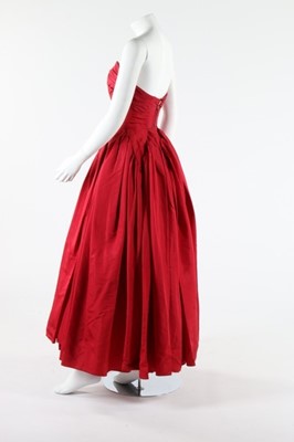 Lot 235 - A Dior London black velvet evening coat, late...