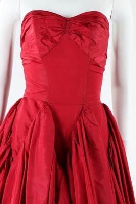 Lot 235 - A Dior London black velvet evening coat, late...