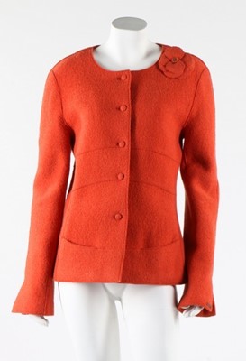 Lot 240 - A Chanel black tweed suit, 1990s, labelled,...