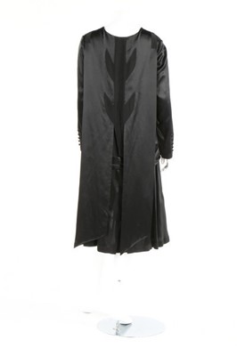 Lot 267 - A black satin dinner dress, circa 1925,...