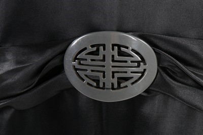 Lot 267 - A black satin dinner dress, circa 1925,...