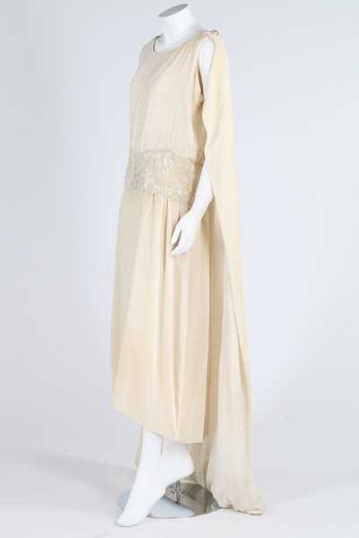 Lot 268 - A velvet bridal/presentation gown, early 1920s,...
