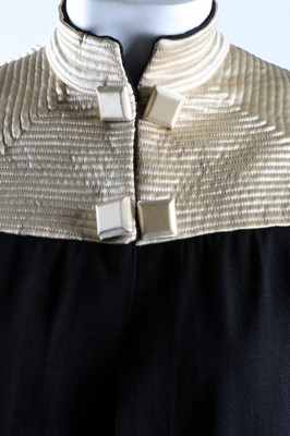 Lot 272 - A black crepe and ivory satin evening ensemble,...