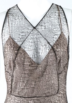 Lot 273 - A cob-web fine black knitted lace evening...