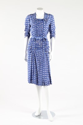 Lot 274 - A Gaston couture black crepe dinner dress,...