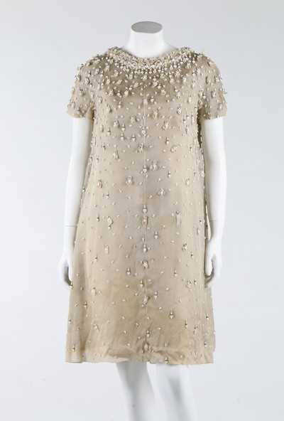 Lot 275 - A Jean Patou couture beaded white organza...