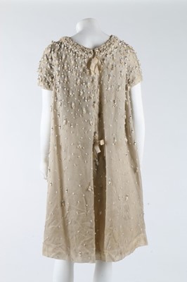 Lot 275 - A Jean Patou couture beaded white organza...