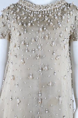 Lot 275 - A Jean Patou couture beaded white organza...