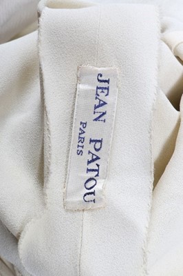 Lot 275 - A Jean Patou couture beaded white organza...