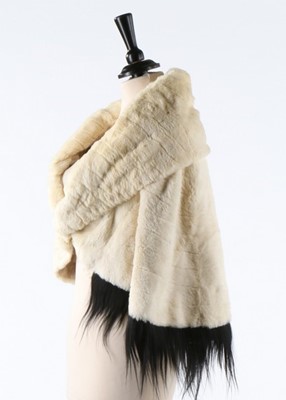 Lot 297 - An ermine cape edged in black monkey fur,...